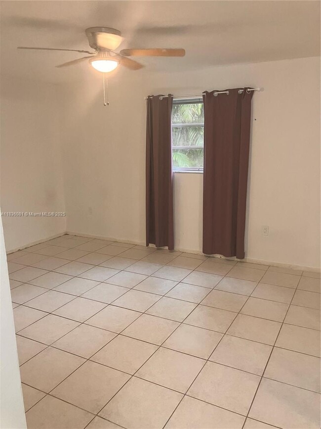 Building Photo - 10901 SW 78th Ave