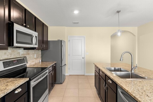 Building Photo - 13911 Smiling Daisy Pl