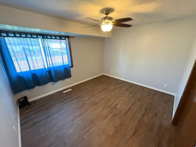 Building Photo - Spacious Single-Family Home with Fenced Backyard & Attached Garage