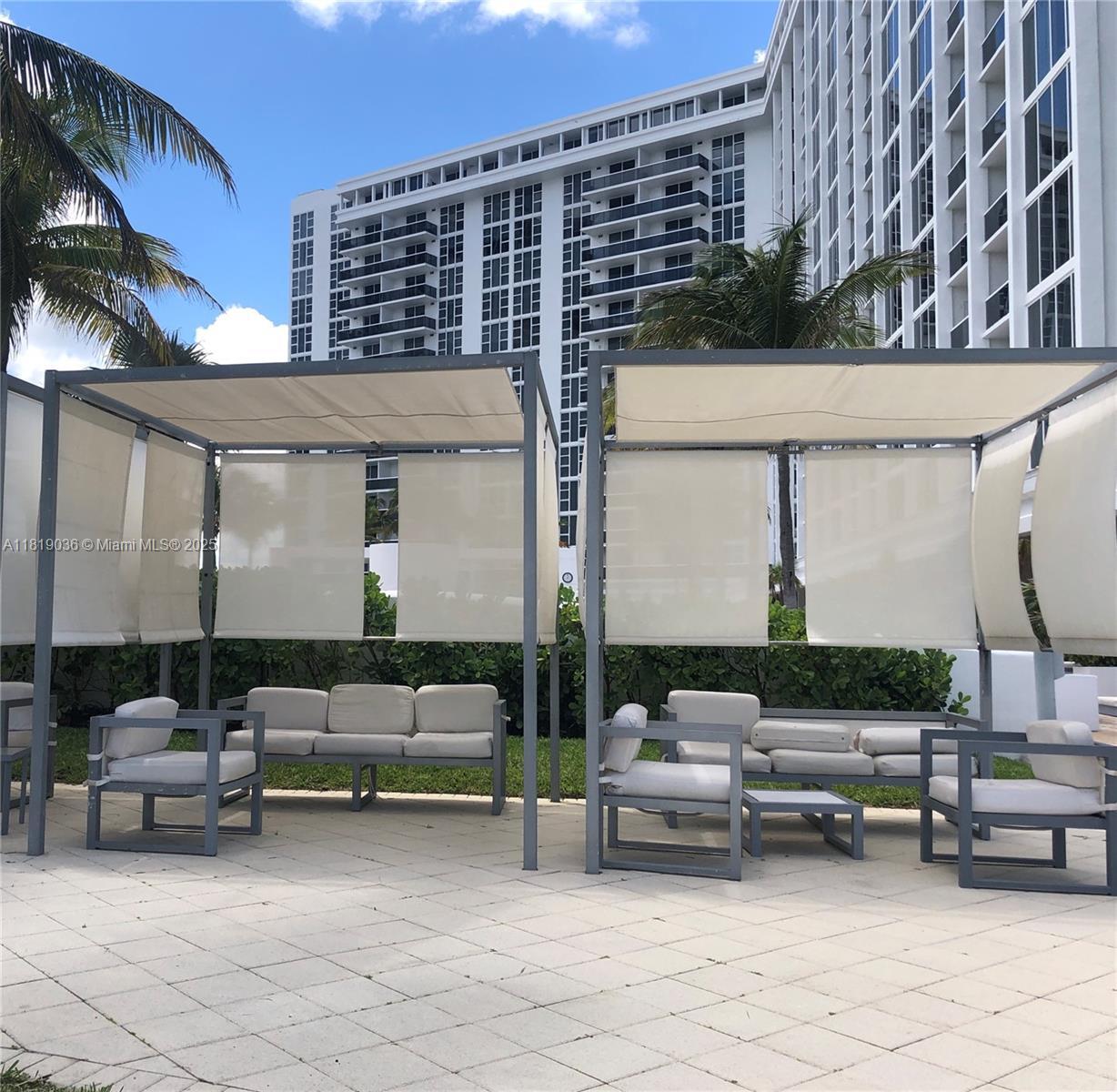 Building Photo - 10275 Collins Ave
