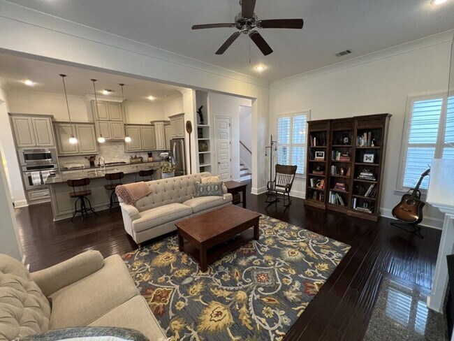 Building Photo - Luxury 4BR Home in Americana | 11 Ft Ceilings, Courtyard Living & Furnished Option