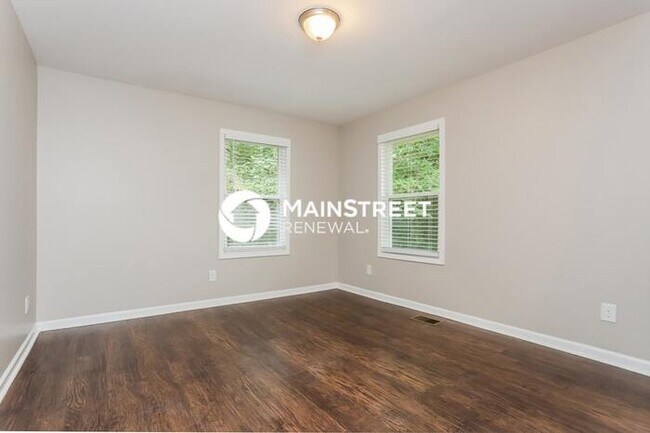 Building Photo - 4 Bedroom Pet-Friendly Home in WOODSTOCK, ...