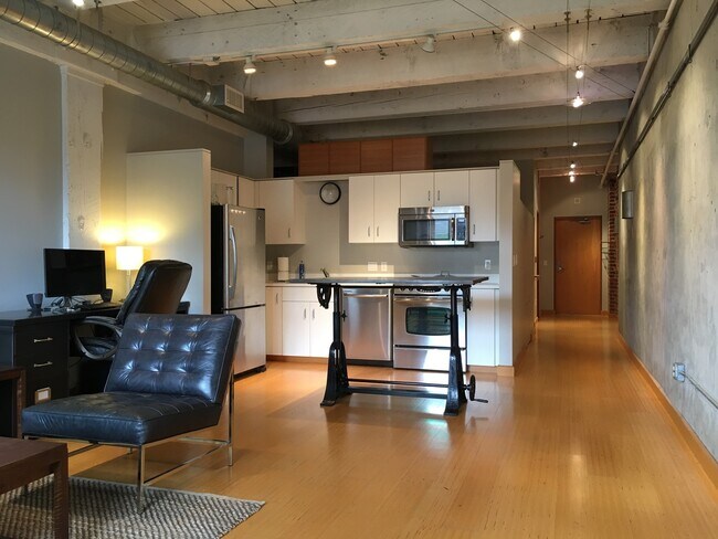 Building Photo - Historic Chown Pella Lofts - east facing studio w/parking/most utilities/rooftop deck
