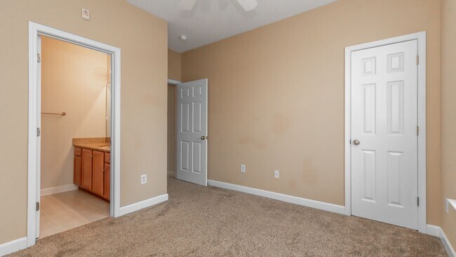 Building Photo - Located just Steps from Shopping, Dining, & Entertainment in The Market Common