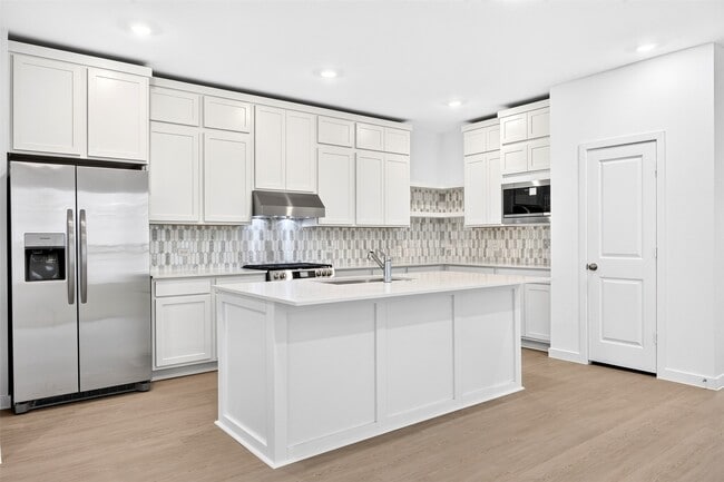 Building Photo - 27447 Sunterra Village Dr
