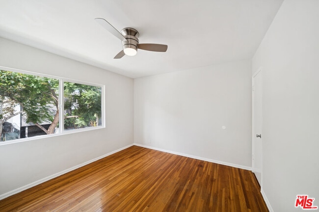 Building Photo - 7571 Willoughby Ave