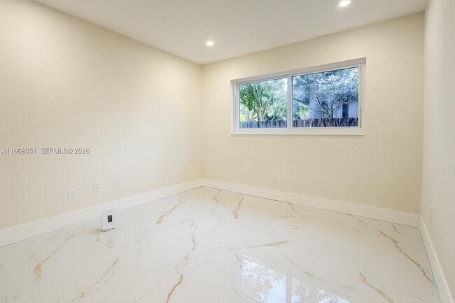 Building Photo - 3801 NE 16th Terrace