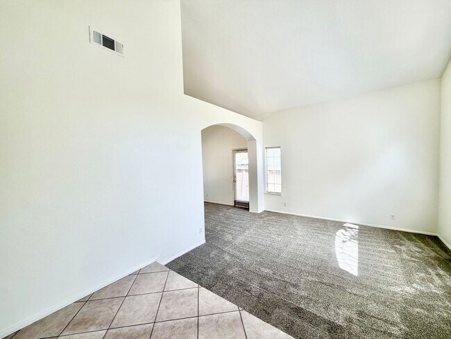 Building Photo - Spacious 5 Bedroom 3 Bathroom Home with Updated Paint, New Roof & Private Balcony
