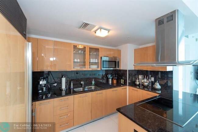 Building Photo - 6899 Collins Ave