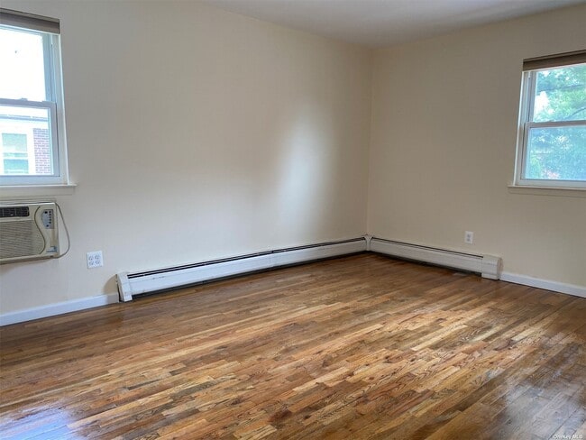 Building Photo - 209-11 41st Ave