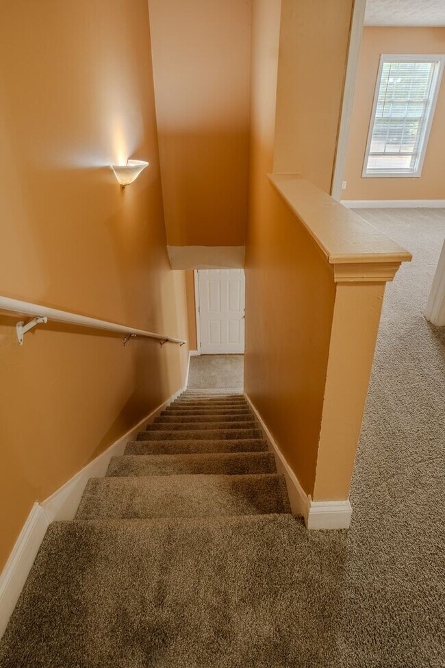 Building Photo - Spacious 4BR/3BA Townhome | Pet Friendly | Washer & Dryer Included | $1,600/mo