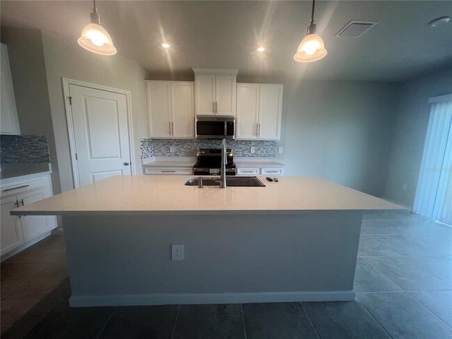 Building Photo - 1717 West Palms Drive