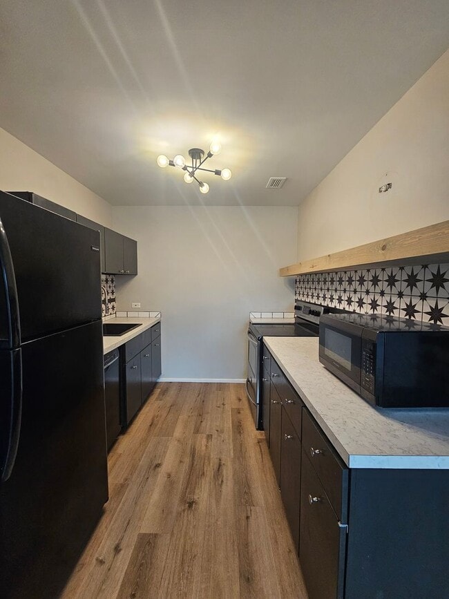 Building Photo - One Bedroom Midtown Condo