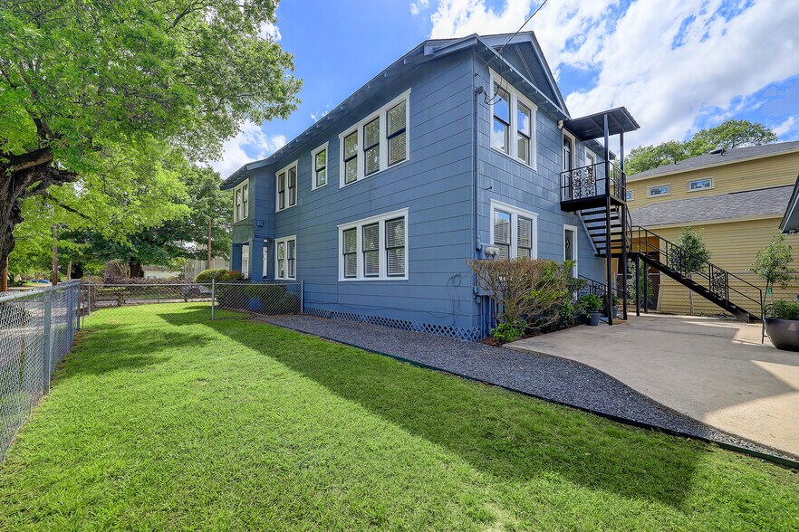 Yard and back patio. - 603 Euclid St
