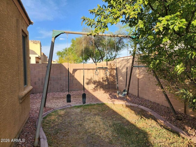 Building Photo - 7643 W Charter Oak Rd