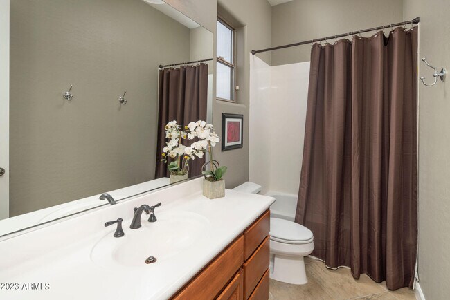 Building Photo - 7895 E Softwind Dr