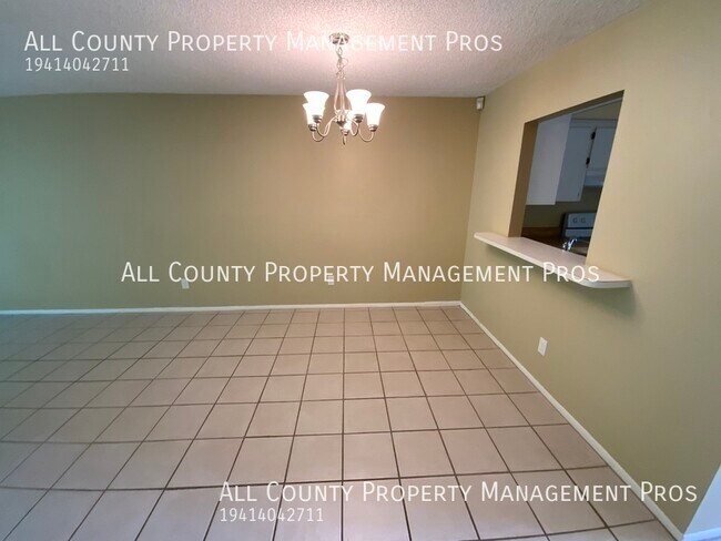Building Photo - 7060 W Country Club Dr N