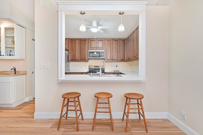 Building Photo - NOW AVAILABLE - 2/2 + Den Villa - 2 Car Ga...