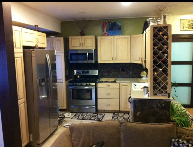 open/large kitchen with custom pantry/cabinets (appliances will be white) - 40 Oak St