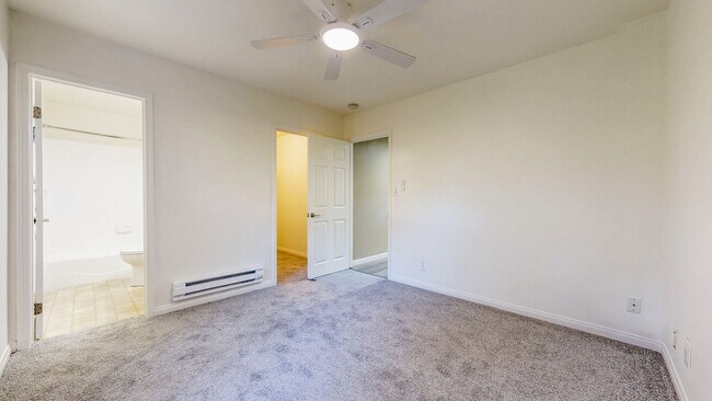 Building Photo - Cozy 1 bedroom 1 bath end unit condo with 1 car garage and private patio located next to Peterson...