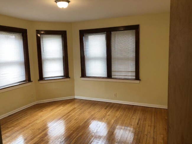 Building Photo - 7655-7657 S Coles Ave