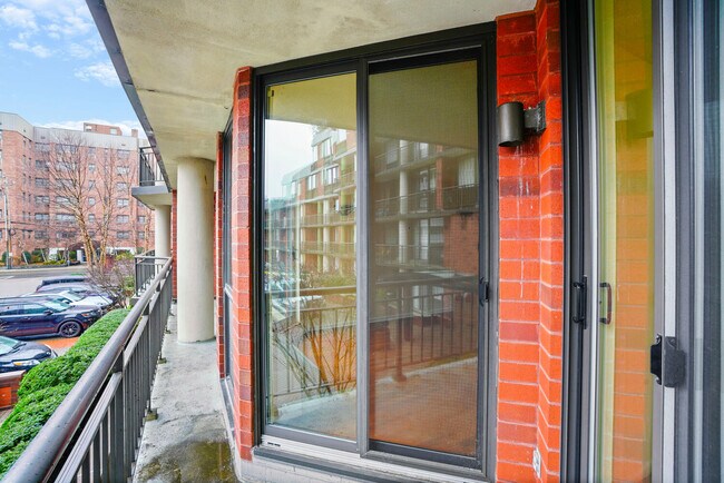 View 2 of long private balcony. - 50 E Hartsdale Ave