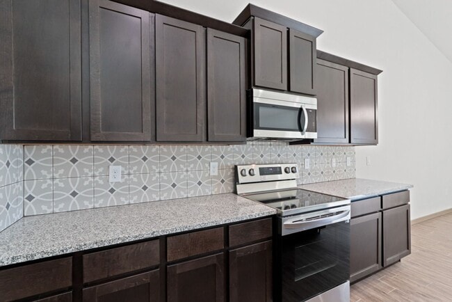 Building Photo - $400 off your first months rent*** Newer 4 bedroom Townhome Available now!