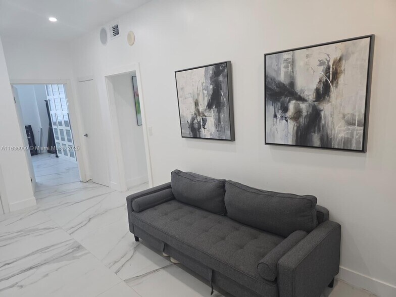 Building Photo - 19370 Collins Ave