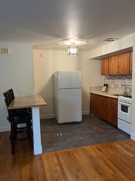 Microwave & Pantry on left of fridge - 723 K St SE