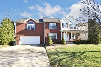 Building Photo - Pet Friendly Three Bedroom with Bonus!