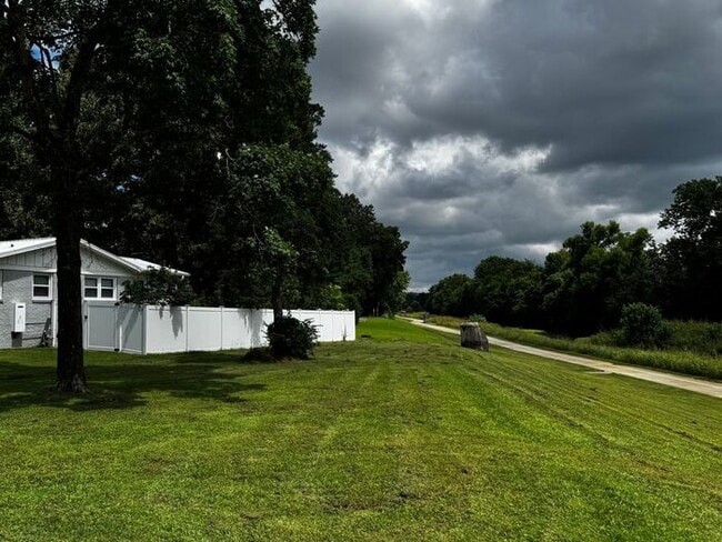 Building Photo - Fenced yard by Greenway near Grissom High School