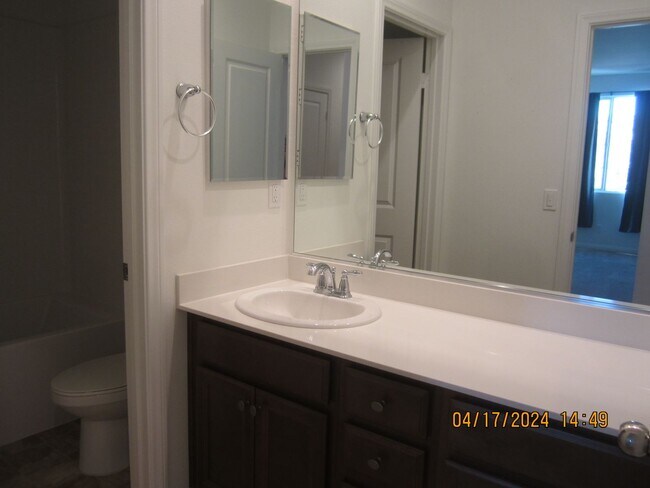 Building Photo - COOL POOL, PARKS AND NEAR NEW 3 BR PLUS DEN IN MEINFEE