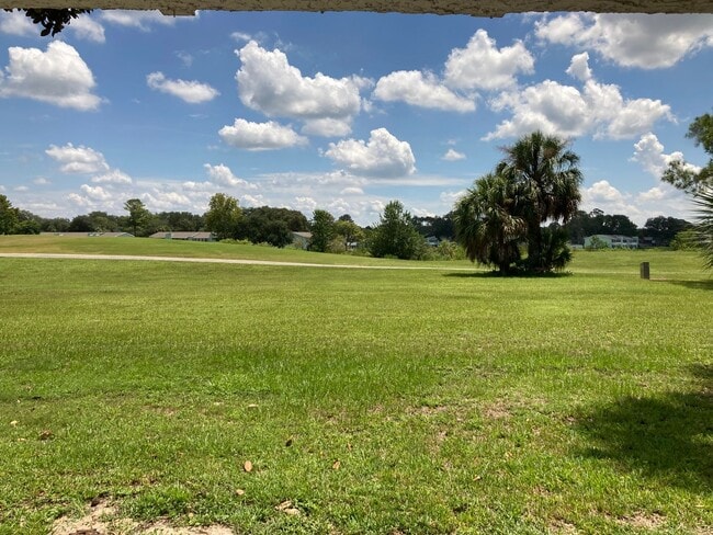 Building Photo - Downstairs 2/2 Country Club Village Condo ...