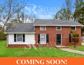 Building Photo - You'll love this charming brick home!
