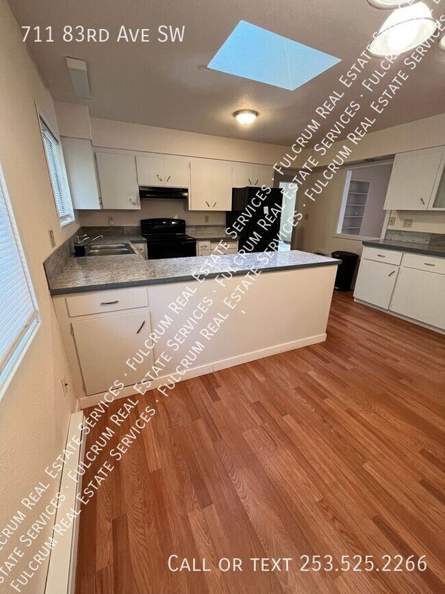 Building Photo - 711 83rd Ave SW
