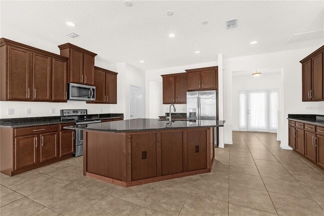 Building Photo - 8130 Red Stopper Ln