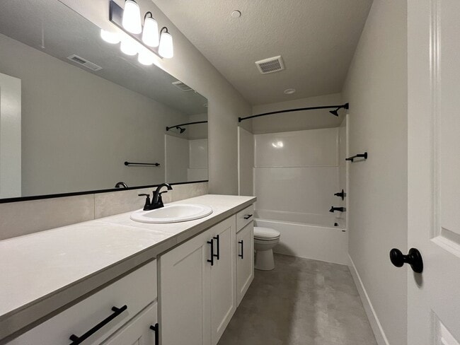 Building Photo - Modern 2025-Built 4 Bedroom Home with EV Charging, 5kW Solar, Open-Concept Living, Scenic Outdoor...