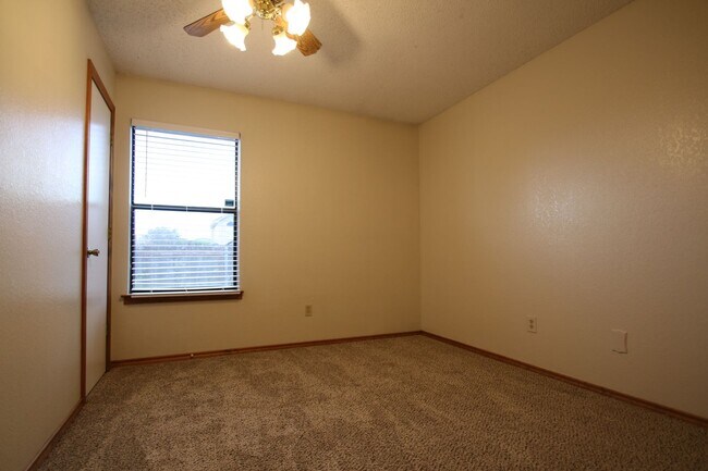 Building Photo - Corner Lot Charmer Off Chapel Creek | 4BR/2BA with Fireplace, Garden Tub & Fenced Backyard