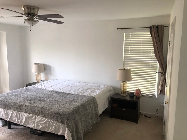 Building Photo - 7518 Snowpea Court, Unit E