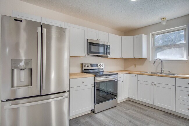 Building Photo - Stunning 4BR/2BA Pensacola Home with Private Pool, Modern Kitchen, Luxury Vinyl Flooring, Fully F...