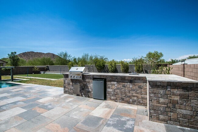 Building Photo - COMING SOON!! Custom single level Luxury home with pool and 4 car garage