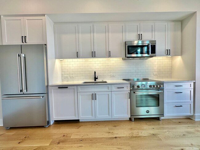 Building Photo - MOVE -IN SPECIAL-FREE RENT! Luxury 2 Bedro...