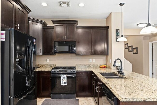 Building Photo - Welcome Home! This stunning 4 bedroom, 3 b...