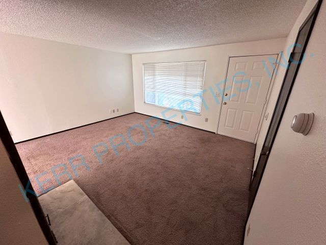 Building Photo - FREE RENT! Charming 2-Bedroom Multiplex in...