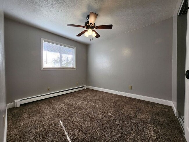 Building Photo - Cozy 2-Bed, 1-Bath Apartment – Upper Level with Covered Outdoor Space!