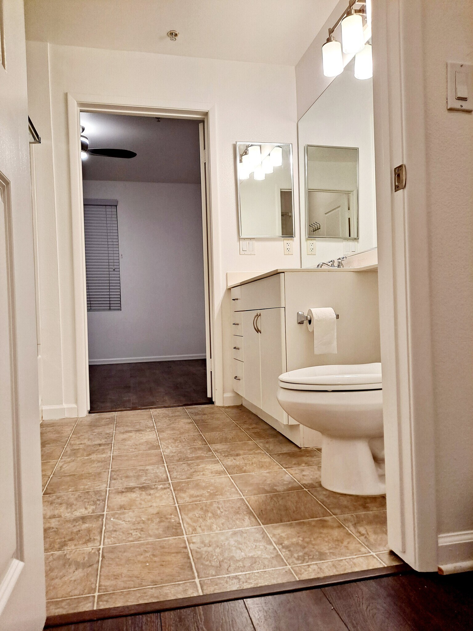 Master bathroom viewed from walk-in closet - 1801 E Katella Ave