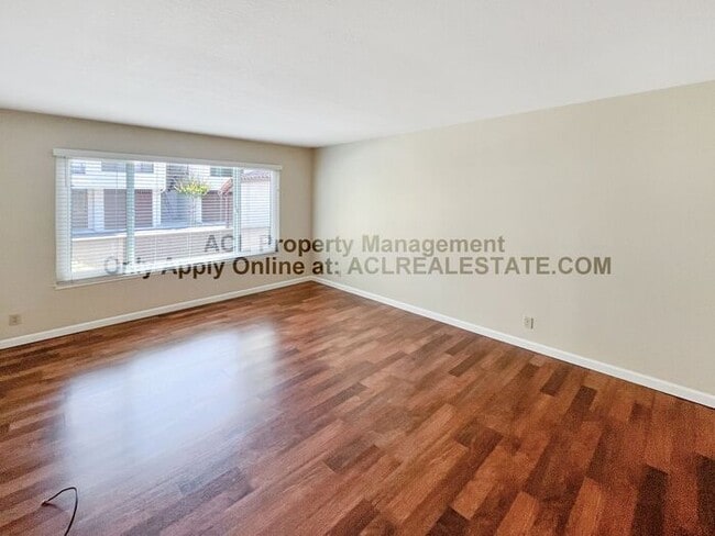 Building Photo - Bright 2BR/2BA Condo with Garage & Pool in...