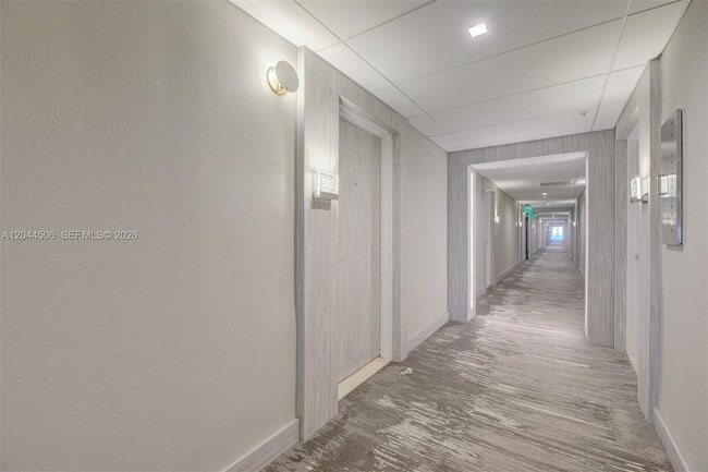 Building Photo - 10275 Collins Ave