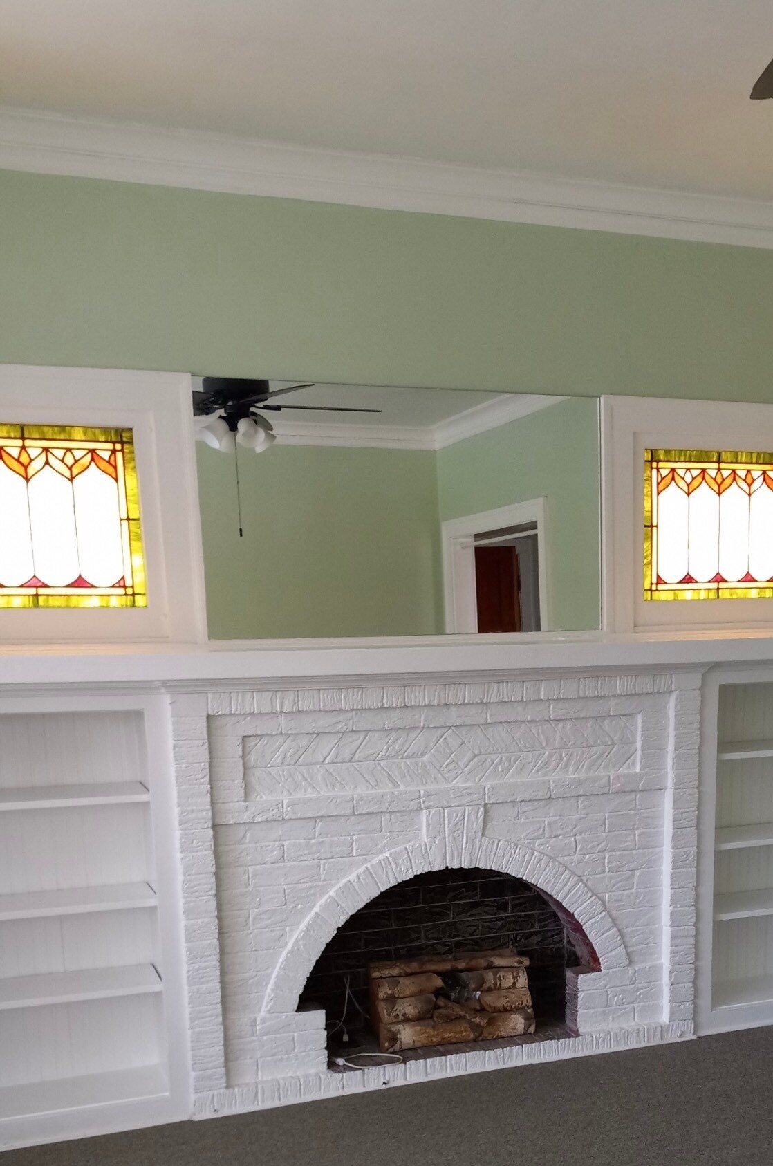 Faux fireplace, windows, built in shelves - 6734 N Oxford Ave