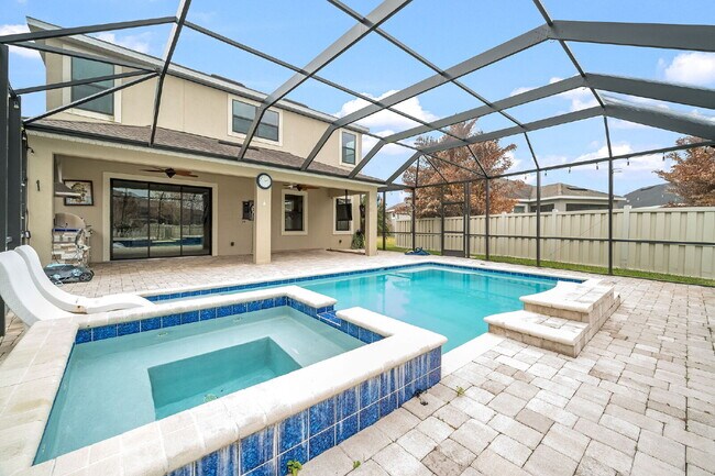 Building Photo - 4BR, 2.5BA home with resort style outdoor living!